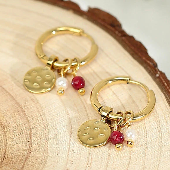 Boucles d’oreilles créoles à pierres rouges