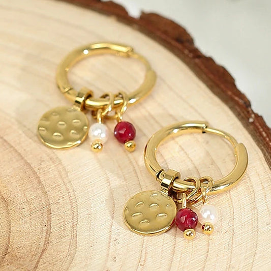 Boucles d’oreilles créoles à pierres rouges