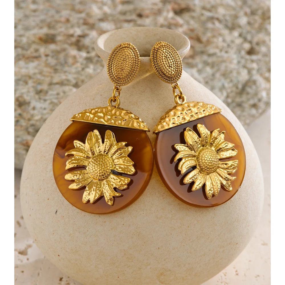 Boucles d’oreilles soleil en résine