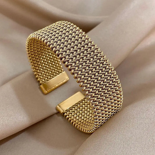 Bracelet manchette doré tissé en acier inoxydable