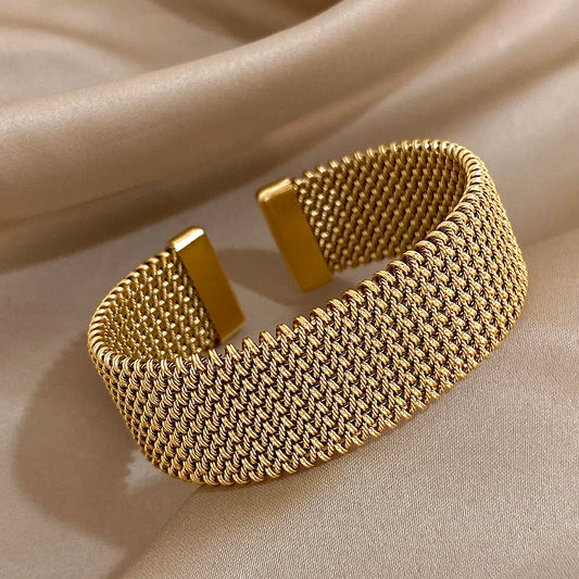 Bracelet manchette doré tissé en acier inoxydable