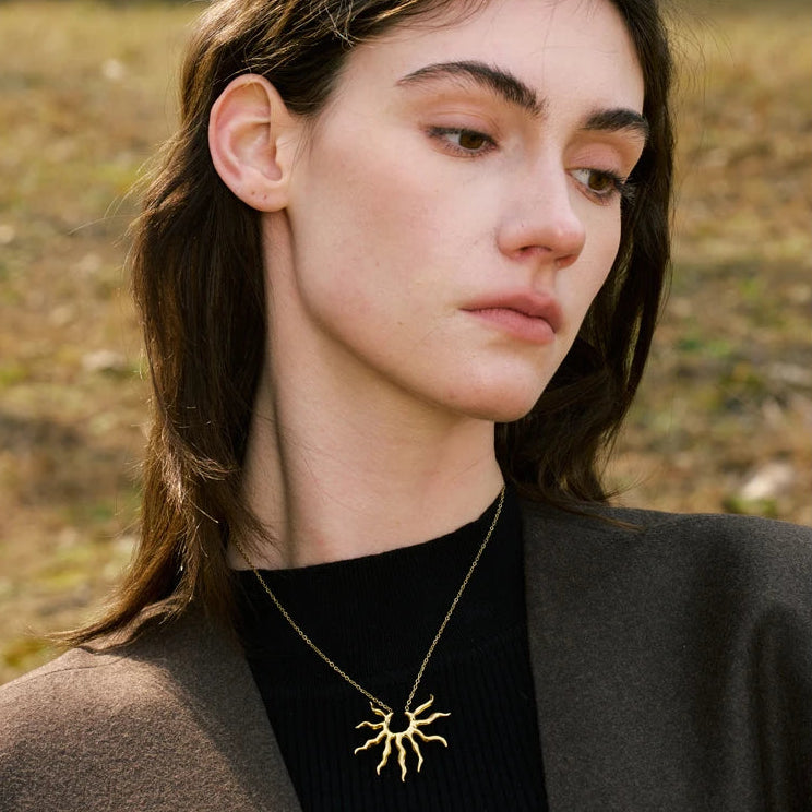 Collier pendentif soleil