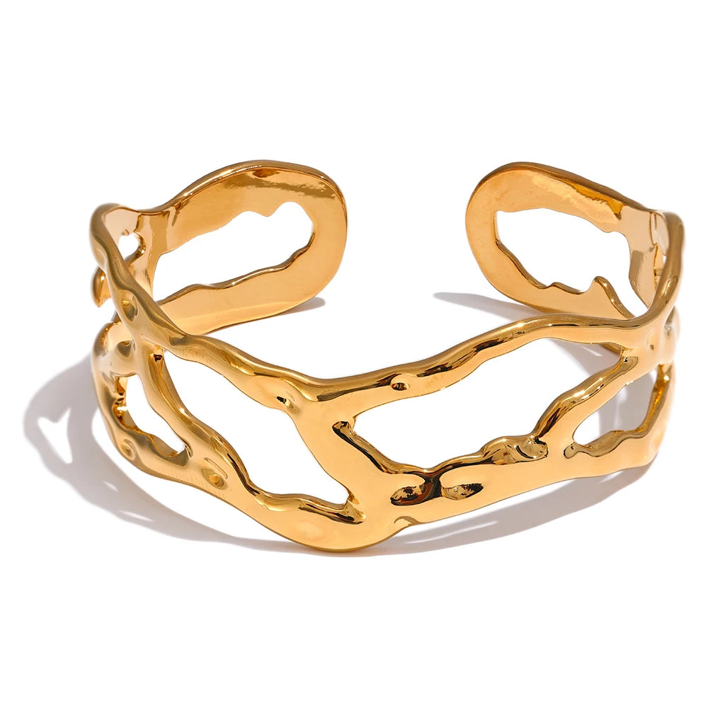 Bracelet manchette large ajouré