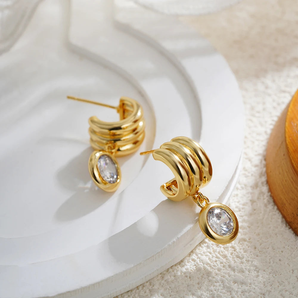 Boucles d’oreilles créoles mini à trois anneaux