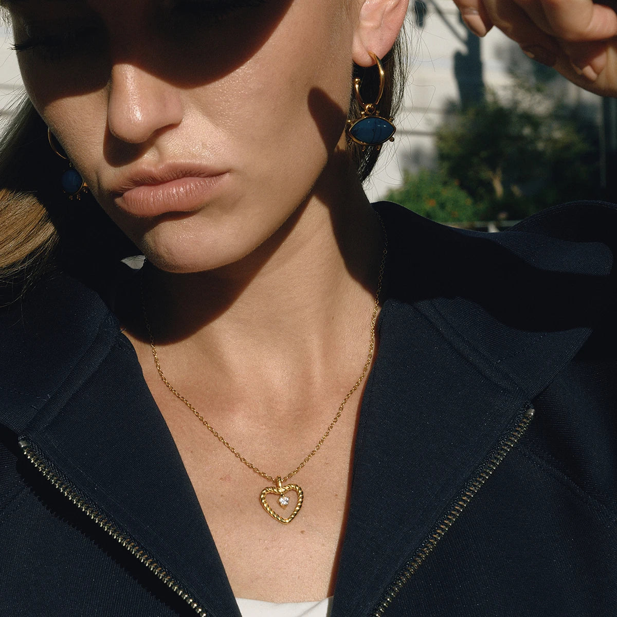 Collier pendentif cœur torsadé en acier inoxydable avec strass