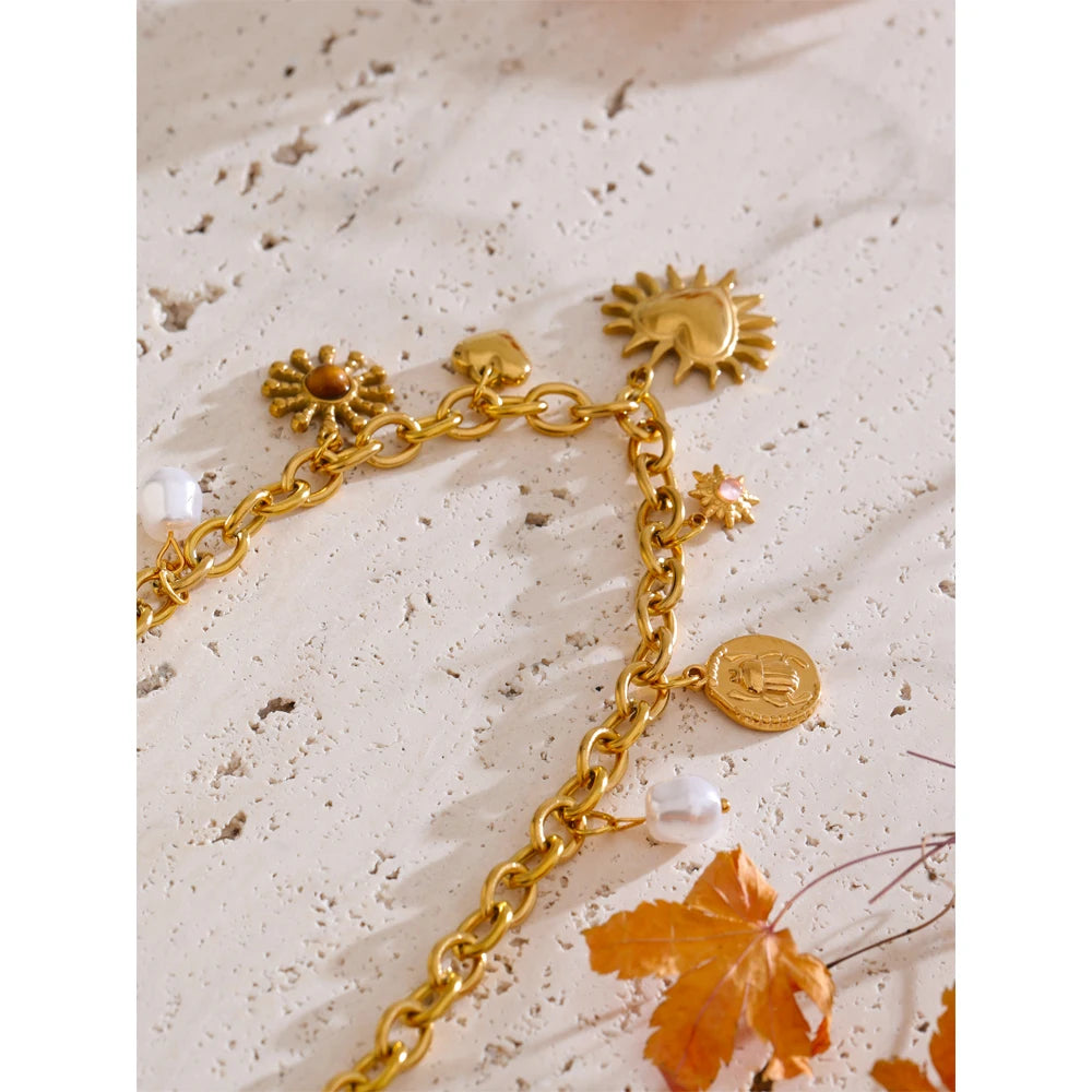 Collier charms soleil, cœur & goutte
